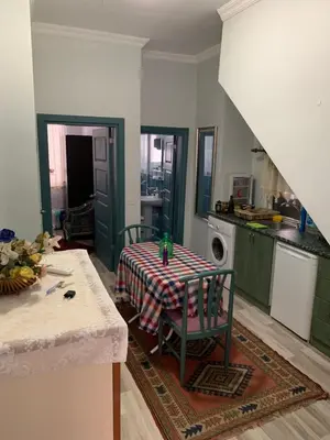 a kitchen with a table with a tablecloth on it at Blue Suites by V in Istanbul