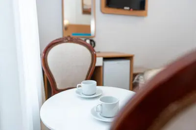 a white table with two cups on top of it at Seatanbul Hotel in Istanbul
