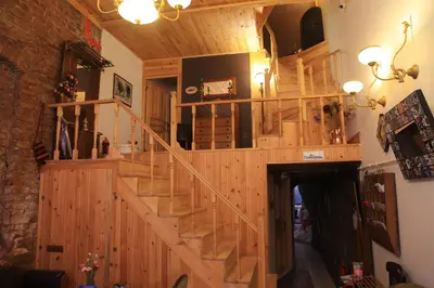 a wooden staircase in a living room with at Tom Square Boutique Hotel in Istanbul