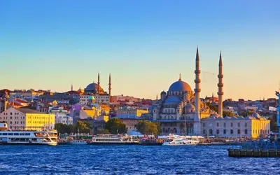 a view of a city from the water with mosques at Sirkeci Grand Family Hotel & SPA in Istanbul