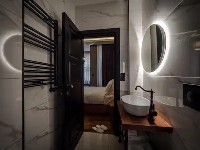 a bathroom with a sink and a mirror at Blu Hotel in Istanbul