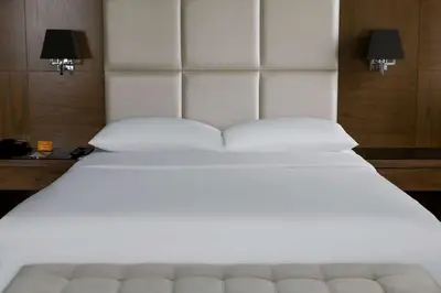 a large white bed with two pillows on it at Park Inn by Radisson Istanbul Asia Kavacik in Istanbul