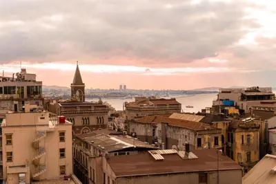 a cityscape of a city with a clock tower at Hotel The Pera Hill in Istanbul