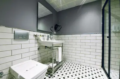 a bathroom with a sink and a toilet at Inncity Hotel Nisantasi in Istanbul