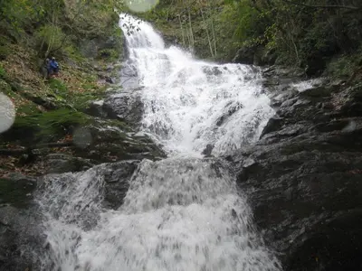 a waterfall on the side of a river at Termal Elit Hotel in Gokcedere
