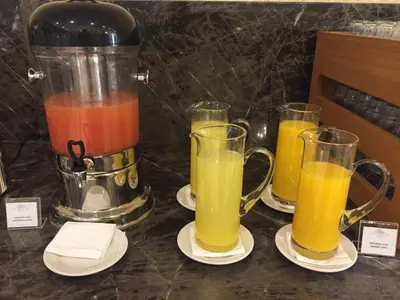 a blender with four different types of juice at Ottoman's Life Hotel Deluxe in Istanbul