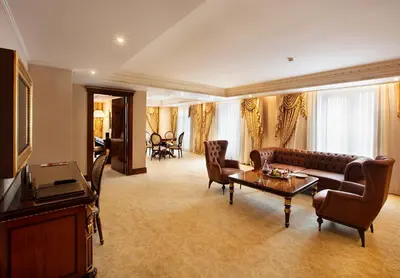 a living room with a couch and a table at Ottoman's Life Hotel Deluxe in Istanbul