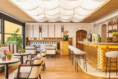 a restaurant with tables and chairs and a bar at Four Seasons Hotel Istanbul at Sultanahmet in Istanbul
