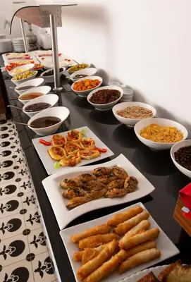 a buffet with many plates of food on a table at Premist Hotels Sultanahmet in Istanbul