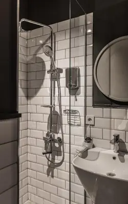 a bathroom with a sink and a mirror at HAUS Galata in Istanbul