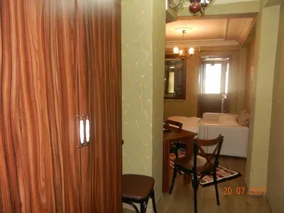 a room with a bedroom with a bed and a door at Royal Suites Sultanahmet in Istanbul