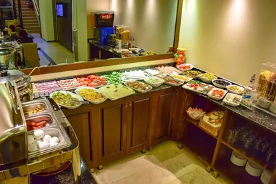 a buffet line with many different types of food at Mekke Hotel Istanbul in Istanbul