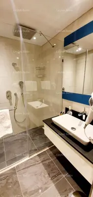 a bathroom with a sink and a shower at Taksim leylak suite in Istanbul
