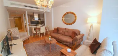 a living room with a couch and a table at Taksim leylak suite in Istanbul