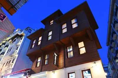 a large wooden building on top of a building at Elyka Hotel in Istanbul