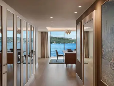 a dining room with a view of the water at The Grand Tarabya Managed by Accor in Istanbul