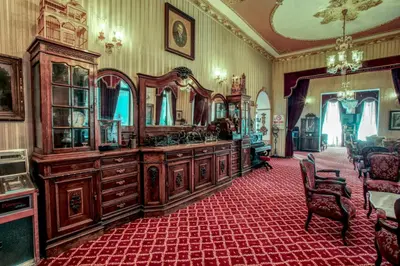 a room with a large vanity with a large mirror at Grand Hotel de Londres in Istanbul