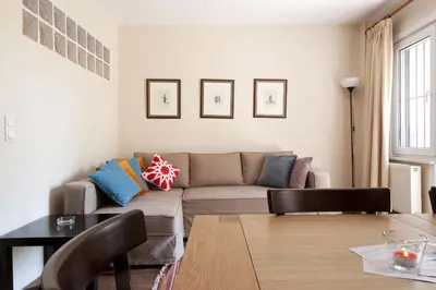 a living room with a couch and a table at Aslan Apartments in Istanbul