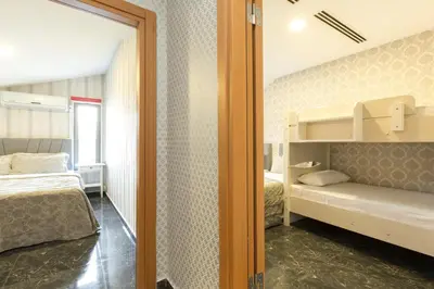 a small bedroom with a bed and a bunk room at The Loft House Taksim in Istanbul
