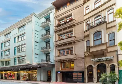 an apartment building on the corner of a street at Taksim Mood in Istanbul