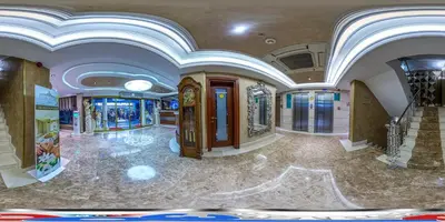 a large room with a lobby with a staircase and a building at Eurostar Old City Hotel & Spa in Istanbul