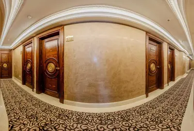 a hallway with wooden doors and a wall at Eurostar Old City Hotel & Spa in Istanbul