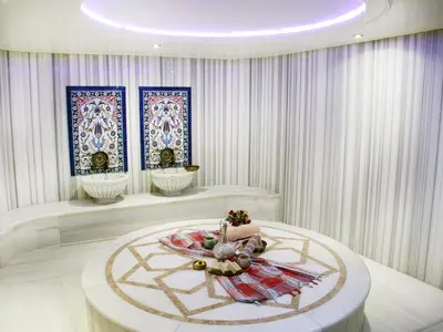 a room with a table with flowers on it at Eurostar Old City Hotel & Spa in Istanbul
