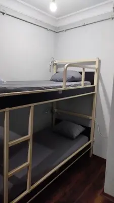 a room with two bunk beds in a room at ivy hostel cafe in Istanbul