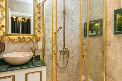 a bathroom with a sink and a shower at Begonville 2 Mansion Oldcity in Istanbul