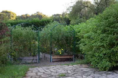 a garden with two gates with plants in it at Casa Lavanda Boutique Hotel in Sile