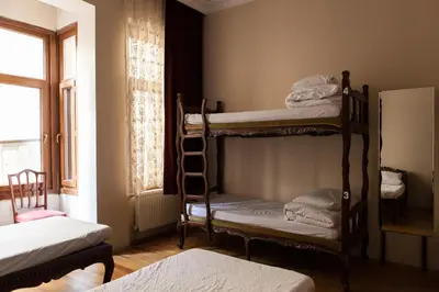 a room with two bunk beds and a window at Chambers of the Boheme in Istanbul