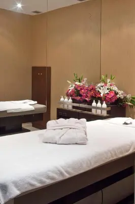 a room with a bed with flowers on it at Victory Hotel & Spa Istanbul in Istanbul