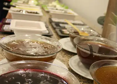 a group of bowls of food on a counter at Sahil Hotel Pendik in Tuzla
