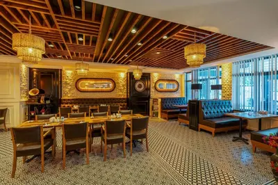 a dining room with a table and chairs at Emirtimes Hotel&Spa - Tuzla in Istanbul