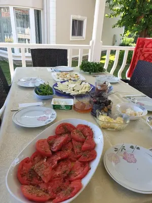 a table with plates of food on top of it at PALACE KIRKPINAR in Sakarya