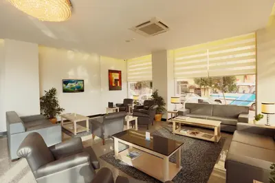 a living room with couches and a table at Hotel Expocity Istanbul in Avcılar