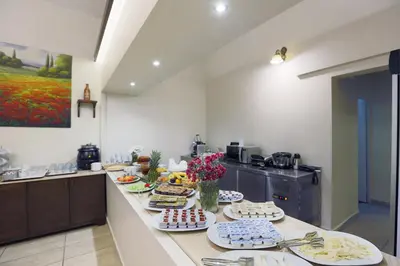 a kitchen with many plates of food on a counter at Hotel Expocity Istanbul in Avcılar