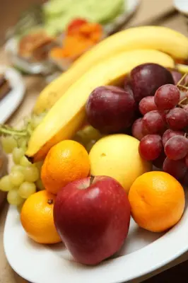 a plate of fruit with apples oranges and bananas at Hotel Expocity Istanbul in Avcılar