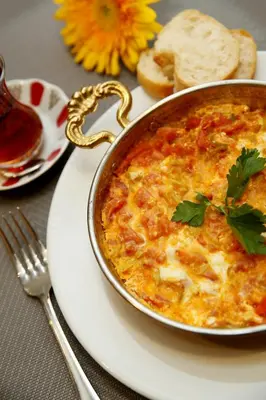 a bowl of food on a plate on a table at Hotel Expocity Istanbul in Avcılar