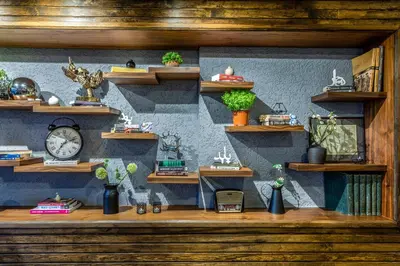 a room with shelves and a clock on a wall at DORUK PALAS HOTEL in Istanbul