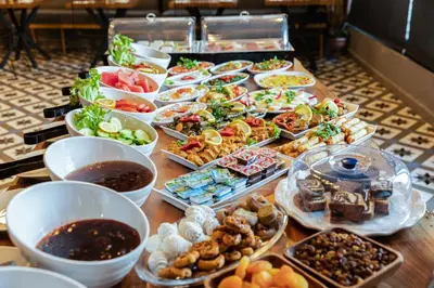 a buffet with many different types of food on a table at DORUK PALAS HOTEL in Istanbul