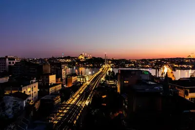 a view of a city at night at DORUK PALAS HOTEL in Istanbul