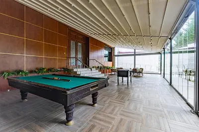 a large room with a pool table in it at The Sign Kocaeli Thermal Spa Hotel &Convention Center in Yeniköy