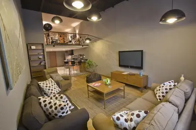 a living room with a couch and a tv at Cityloft 36 in Istanbul