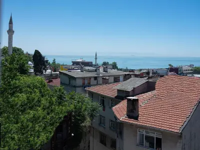 a view of a city with buildings and the ocean at THE LAİLA HOTEL in Istanbul