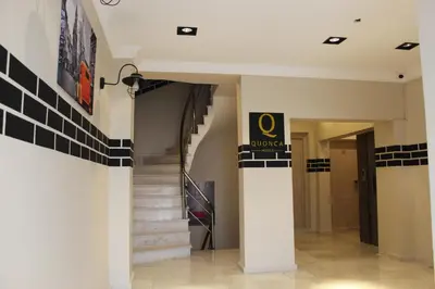 a staircase in a building with black and white tiles at THE LAİLA HOTEL in Istanbul