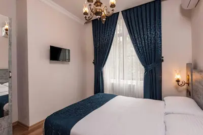 a bedroom with a bed and a window at Element Garden in Istanbul