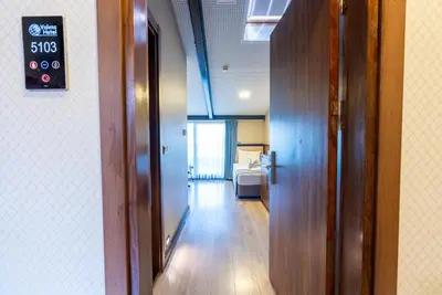 a hallway with a door to a room at Valens Hotel Downtown in Istanbul