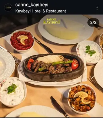 a table topped with dishes of food on a table at Kayıbeyi Hotel & Restaurant in Bursa