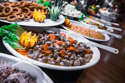 a buffet with plates of food on a table at Karinna Hotel Convention Center & Spa Luxury - Full Board Plus in Uludag